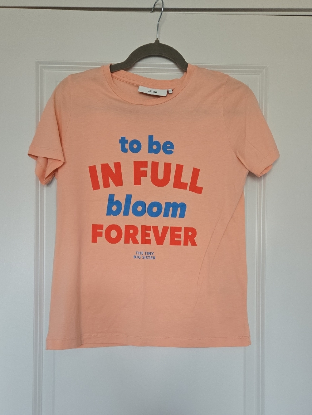 The Tiny Big Sister Peach Graphic Tee "In Full Bloom Forever"